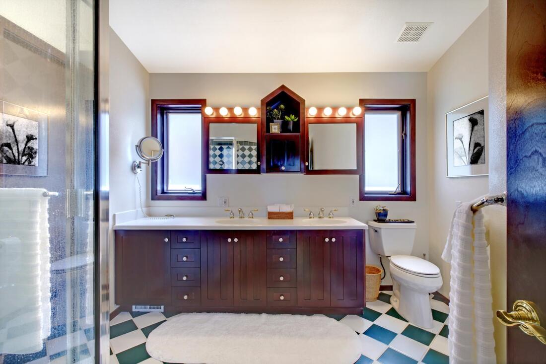 Fort Wayne bathroom with white and green tile flooring